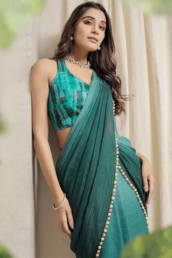 Sea green plain chiffon designer saree with blouse piece
