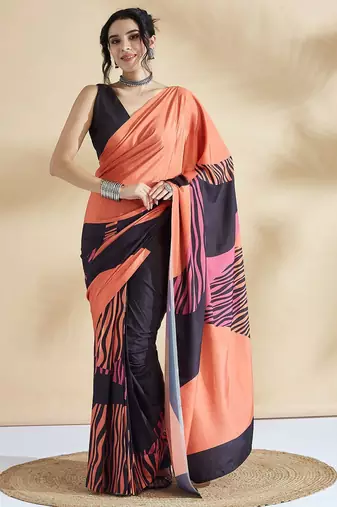 Orange printed crepe casual saree with blouse piece