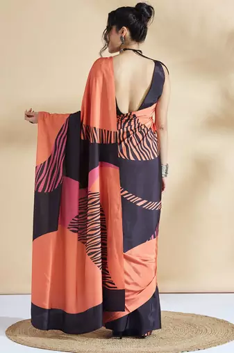 Orange printed crepe casual saree with blouse piece
