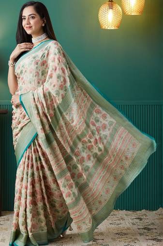 Cream printed brasso casual saree with blouse piece
