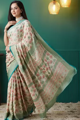 Cream printed brasso casual saree with blouse piece