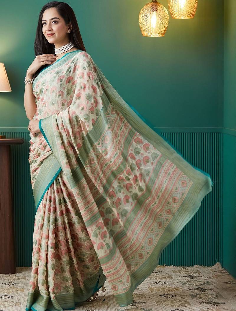 Cream printed brasso casual saree with blouse piece