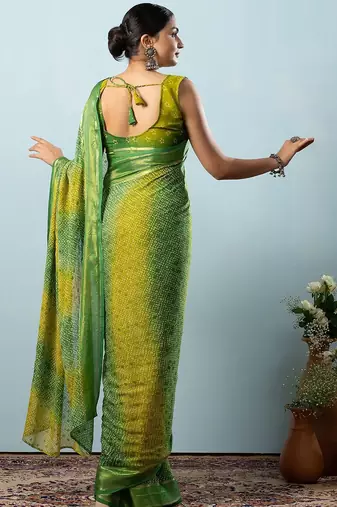 Green elegant printed georgette saree with blouse piece