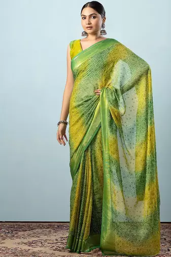 Green elegant printed georgette saree with blouse piece