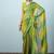 Green elegant printed georgette saree with blouse piece