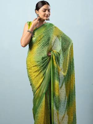Green elegant printed georgette saree with blouse piece 4
