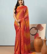 Red elegant printed georgette saree with blouse piece
