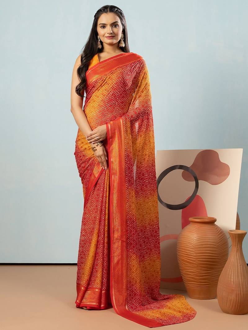 Red elegant printed georgette saree with blouse piece
