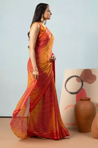 Red elegant printed georgette saree with blouse piece