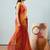 Red elegant printed georgette saree with blouse piece