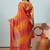 Red elegant printed georgette saree with blouse piece