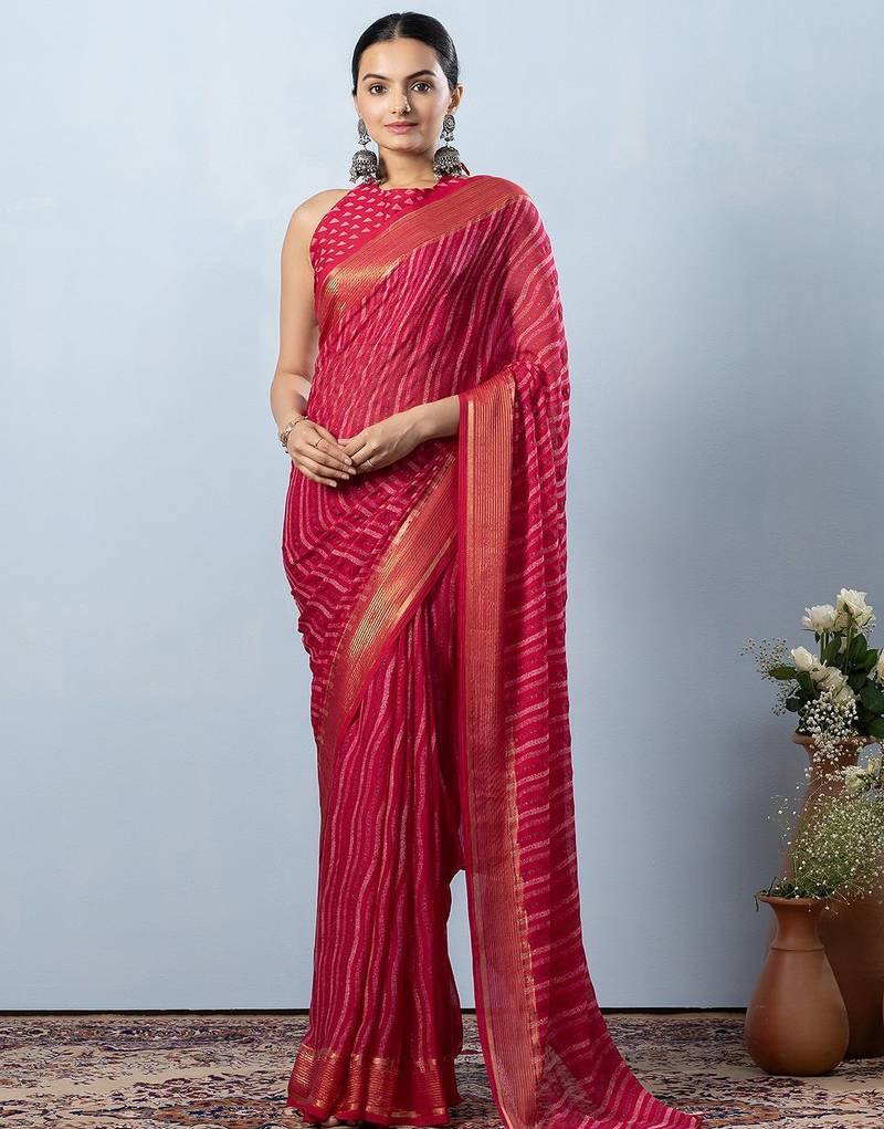 Pink elegant printed georgette saree with blouse piece