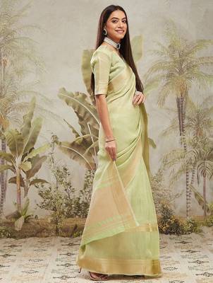 Green elegant zari woven linen saree with blouse piece 1