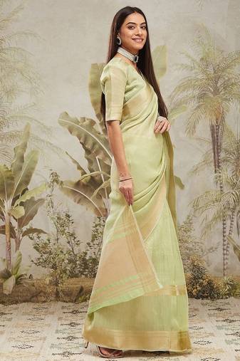Green elegant zari woven linen saree with blouse piece