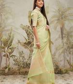 Green elegant zari woven linen saree with blouse piece