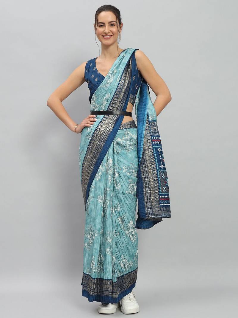 Green printed silk blend ethnic saree with blouse piece