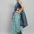 Green printed silk blend ethnic saree with blouse piece