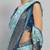 Green printed silk blend ethnic saree with blouse piece