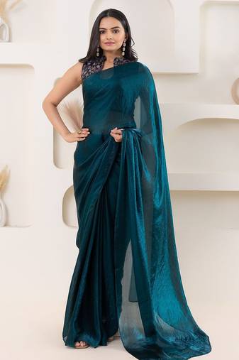 Teal plain tissue festive wear saree with blouse piece