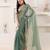 Green plain tissue festive wear saree with blouse piece