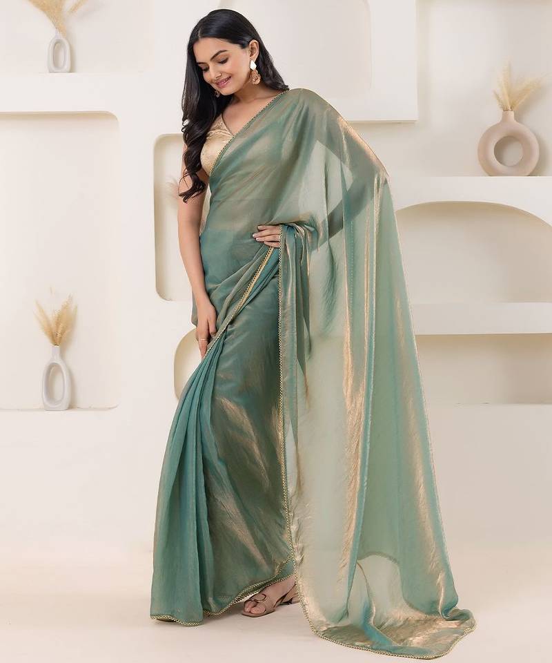 Green plain tissue festive wear saree with blouse piece