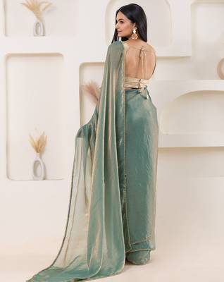 Green plain tissue festive wear saree with blouse piece 2