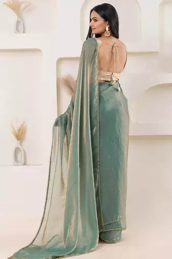 Green plain tissue festive wear saree with blouse piece