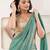 Green plain tissue festive wear saree with blouse piece
