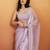 Lavender plain tissue festive wear saree with blouse piece