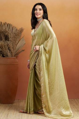 Green plain tissue festive wear saree with blouse piece