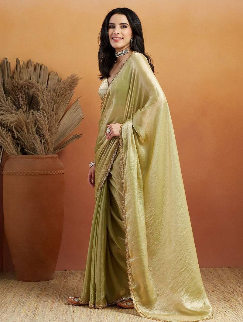 Green plain tissue festive wear saree with blouse piece