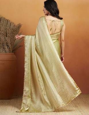 Green plain tissue festive wear saree with blouse piece 2