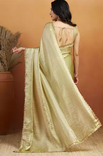 Green plain tissue festive wear saree with blouse piece