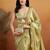 Green plain tissue festive wear saree with blouse piece