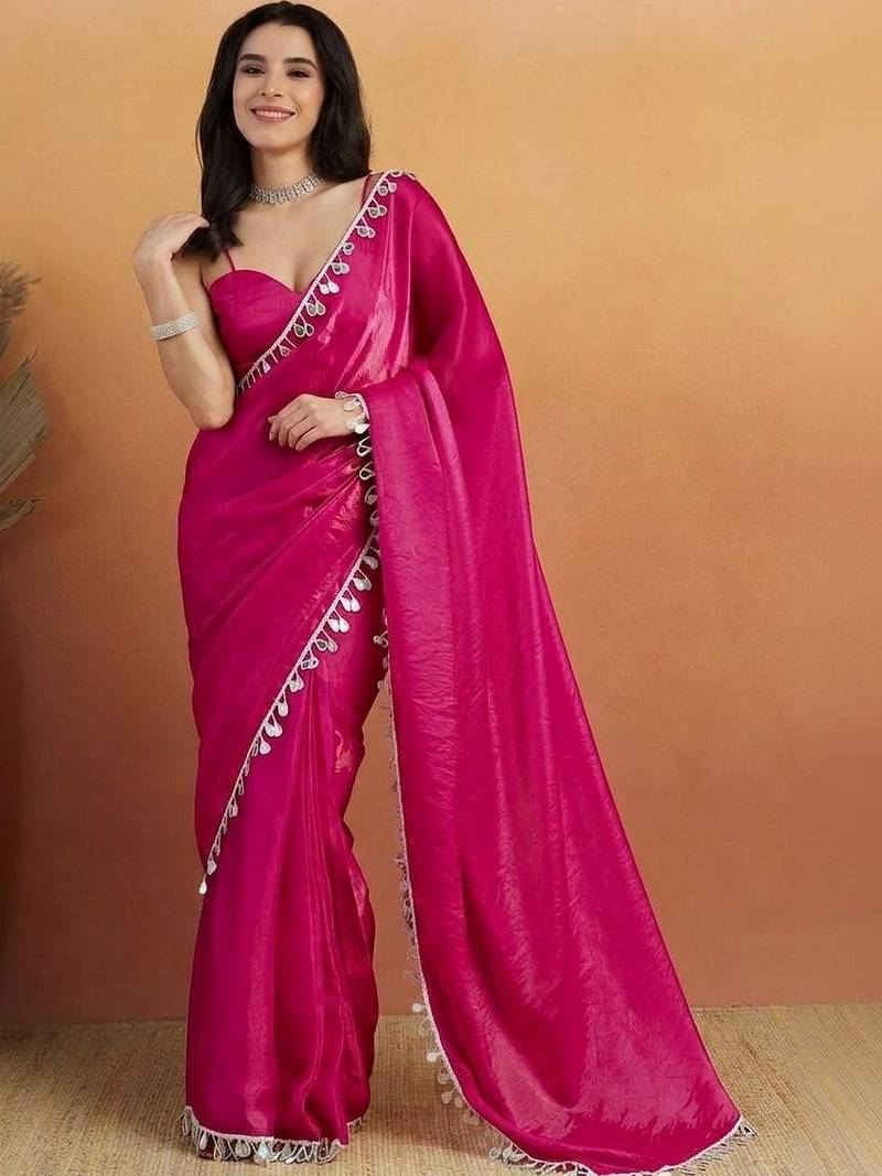 Magenta plain tissue festive wear saree with blouse piece