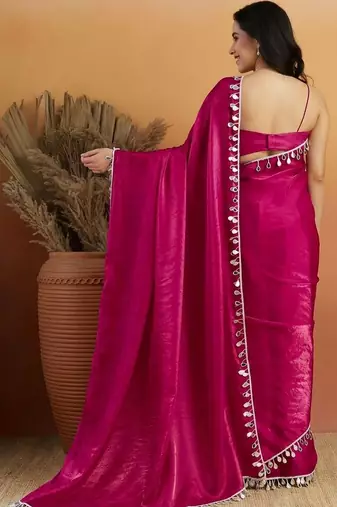 Magenta plain tissue festive wear saree with blouse piece