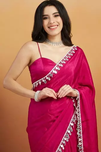 Magenta plain tissue festive wear saree with blouse piece