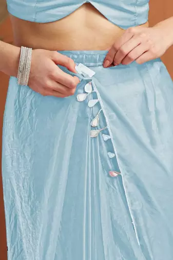 Turquoise blue plain tissue festive wear saree with blouse piece