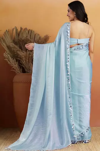 Turquoise blue plain tissue festive wear saree with blouse piece