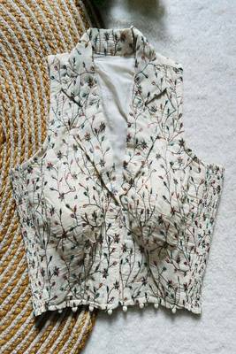 Off white floral embroidered cotton designer readymade sleeveless saree blouse for women festive wear 1