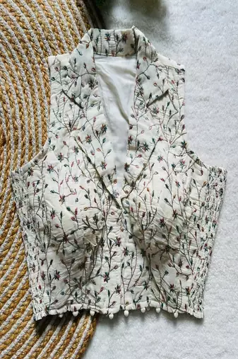 Off white floral embroidered cotton designer readymade sleeveless saree blouse for women festive wear
