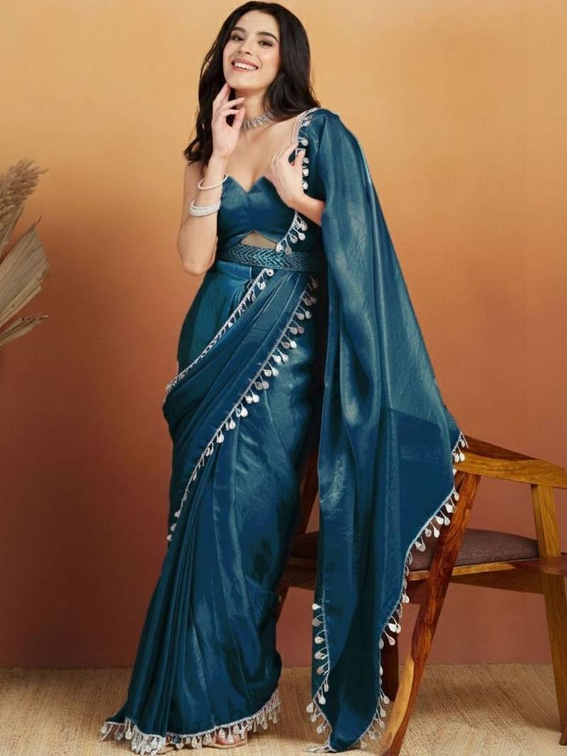 Teal plain tissue festive wear saree with blouse piece