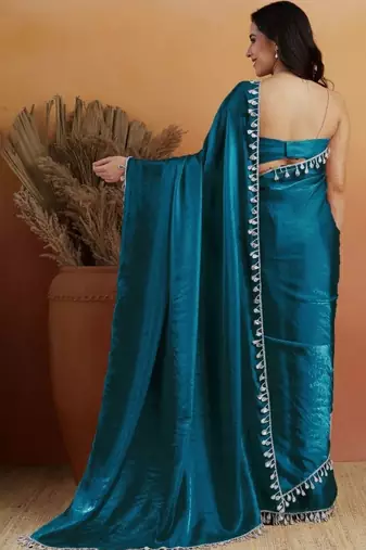 Teal plain tissue festive wear saree with blouse piece