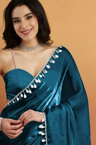 Teal plain tissue festive wear saree with blouse piece