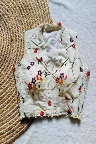 Off white floral embroidered cotton designer sleeveless readymade saree blouse for women festive wear