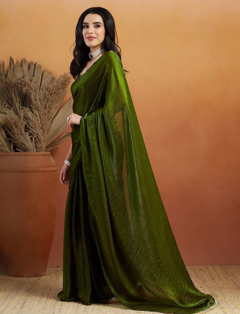 Green plain tissue festive wear saree with blouse piece