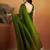 Green plain tissue festive wear saree with blouse piece