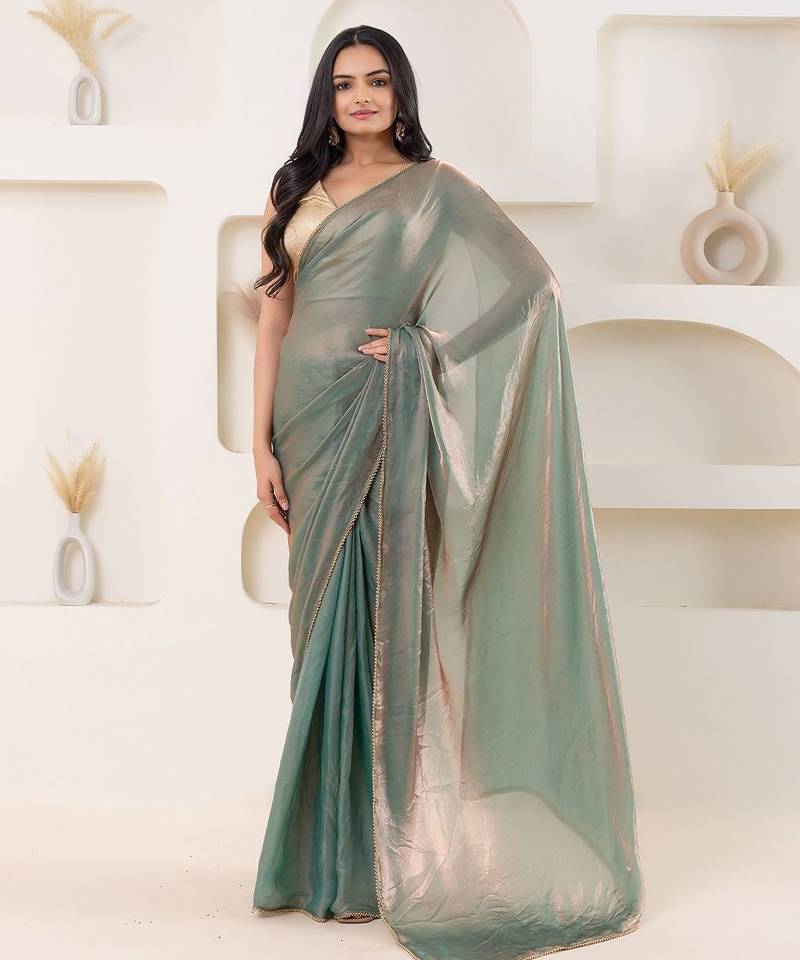 Blue plain tissue festive wear saree with blouse piece