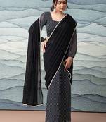 Black elegant printed georgette saree with blouse piece
