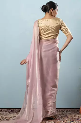 Pink plain tissue festive wear saree with blouse piece